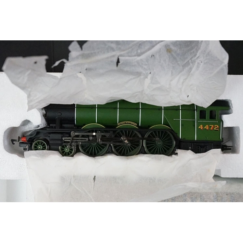 2 - Two boxed Hornby OO gauge electric train sets to include R1039 Flying Scotsman and R1048 The Western... 