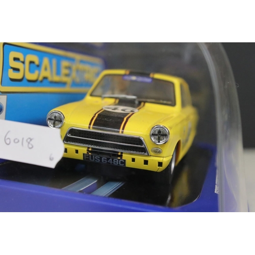 1364 - Six cased slot cars to include 5 x Scalextric (C3205 Jaguar D Type, C3502 Ford Cortina MK1, C3143 MG... 