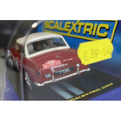 1364 - Six cased slot cars to include 5 x Scalextric (C3205 Jaguar D Type, C3502 Ford Cortina MK1, C3143 MG... 