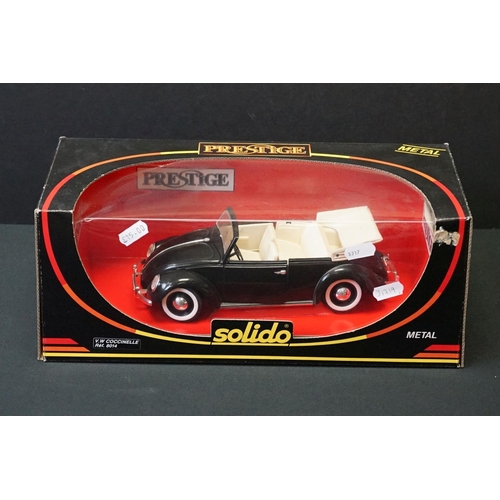 Four boxed 1 18 diecast models to include Solido Prestige 8014 VW