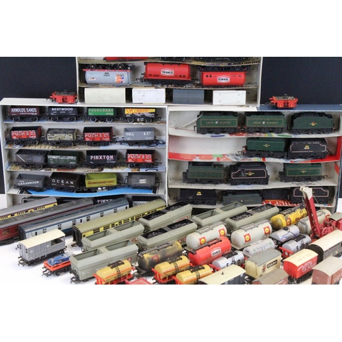 117 - Over 80 OO gauge items of rolling stock to include tankers, tender, trucks and wagons featuring Tria... 