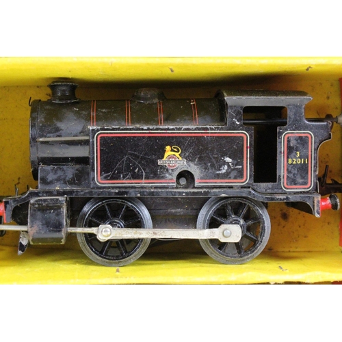 118 - Boxed Hornby O gauge Tank Goods Set No 45 containing BR 0-4-0 locomotive in black livery, track and ... 