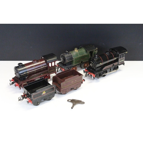 151 - Three Hornby OO gauge locomotives to include 0-4-0 LMS with tender in maroon, 0-4-0 60199 BR black w... 