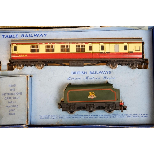 15 - Three boxed Hornby Dublo train sets to include 2 x EDP12 Passenger Train with Duchess of Montrose lo... 
