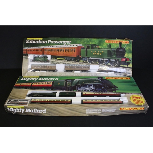 13 - Two boxed Hornby OO gauge electric train sets to include R542 Mighty Mallard and R725 Suburban Passe... 