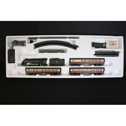 13 - Two boxed Hornby OO gauge electric train sets to include R542 Mighty Mallard and R725 Suburban Passe... 