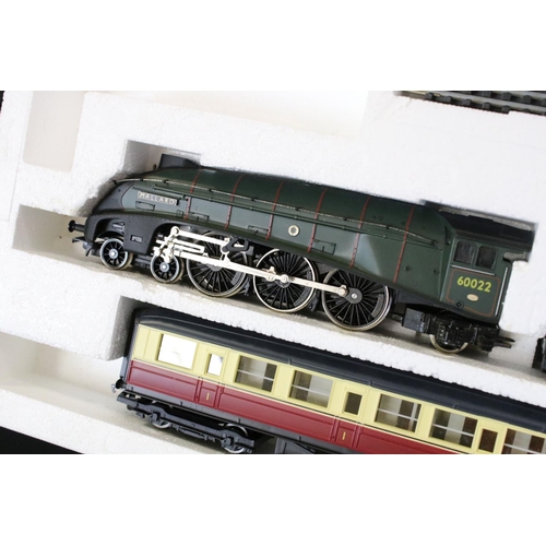 13 - Two boxed Hornby OO gauge electric train sets to include R542 Mighty Mallard and R725 Suburban Passe... 