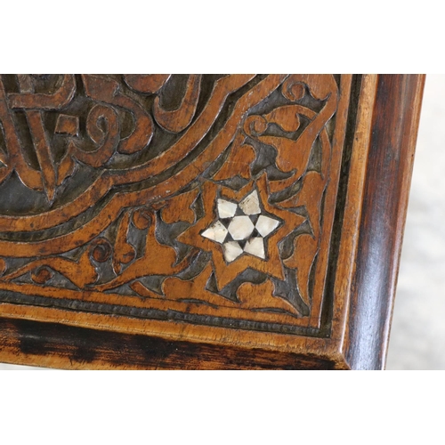 551 - In the manner of Liberty of London, Hardwood Square Table in the Moorish style with masharabiya pane... 