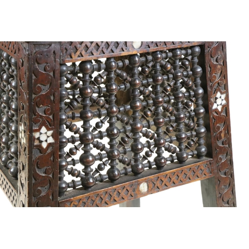 551 - In the manner of Liberty of London, Hardwood Square Table in the Moorish style with masharabiya pane... 