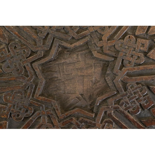 551 - In the manner of Liberty of London, Hardwood Square Table in the Moorish style with masharabiya pane... 