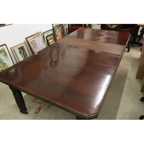 555 - Late Victorian Mahogany Wind-out Dining Table with two additional leaves raised on turned ringed and... 