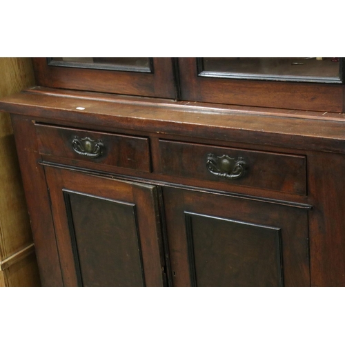 559 - Victorian Mahogany Glazed Bookcase, the upper section with two glazed doors opening to three adjusta... 