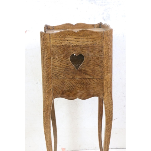 560 - French Oak Bedside Table in the Louis XV manner with carved pierced hearts to sides, 38cm wide x 71c... 