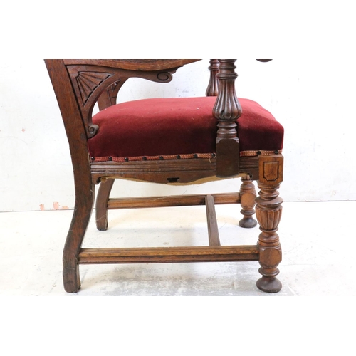 564 - Large 19th century Carved Oak ' Throne ' Elbow Chair, the arched top with carved cresting and carved... 