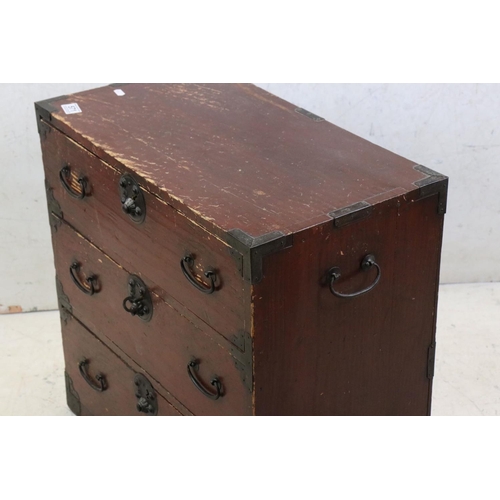 571 - Oriental Red Stained Campaign style Chest of Three Drawers with metal mounts and carrying handles, w... 