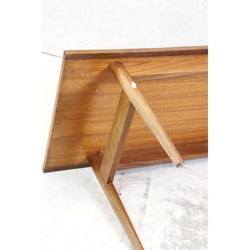 591 - Mid century Retro Teak Long Rectangular Coffee Table raised on turned legs, 122cm long x 41cm high