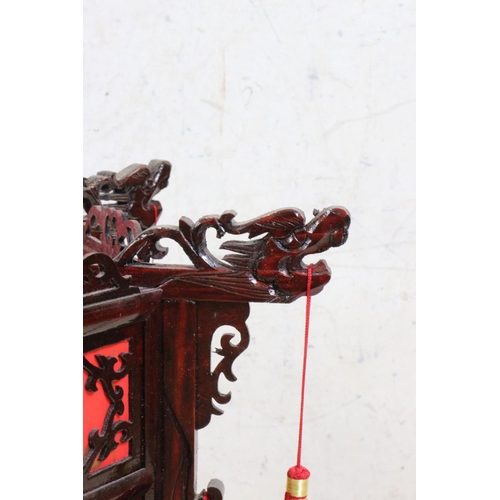 613 - Pair of Chinese Wood Dragon Palace Lanterns with red paper panels and red tassels, 45cm high