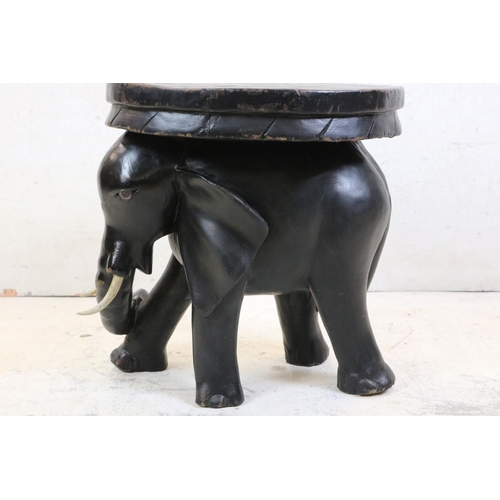 619 - Ebonised Stool in the form of an Elephant, 48cm high