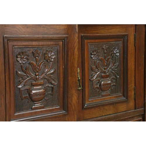 621 - Victorian Pollard Oak Breakfront Sideboard comprising an arrangement of carved cupboard doors and dr... 