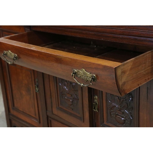 621 - Victorian Pollard Oak Breakfront Sideboard comprising an arrangement of carved cupboard doors and dr... 