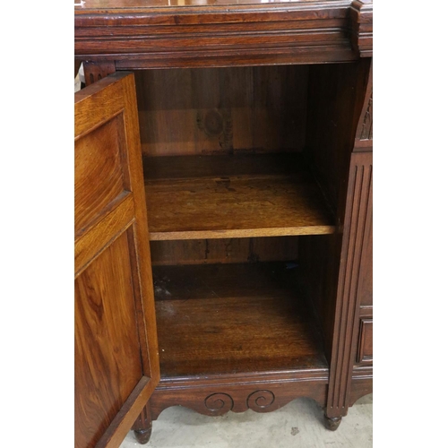 621 - Victorian Pollard Oak Breakfront Sideboard comprising an arrangement of carved cupboard doors and dr... 