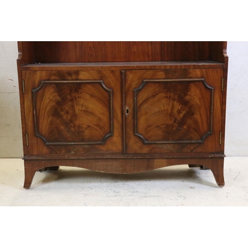 624 - Early 20th century Mahogany Waterfall Bookcase with two cupboard doors below, 83cm wide x 122cm high