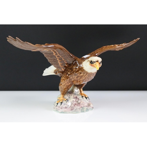 80 - Four Beswick porcelain figures to include 1018 Bald Eagle (33cm wingspan), ' Spirit of the Wind ' mo... 