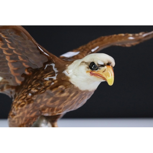 80 - Four Beswick porcelain figures to include 1018 Bald Eagle (33cm wingspan), ' Spirit of the Wind ' mo... 