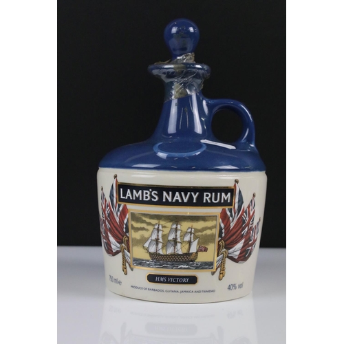 90 - Lamb's Navy Rum 750ml decanter bottle with contents, 40% Vol (appears unopened), together with 2 x P... 