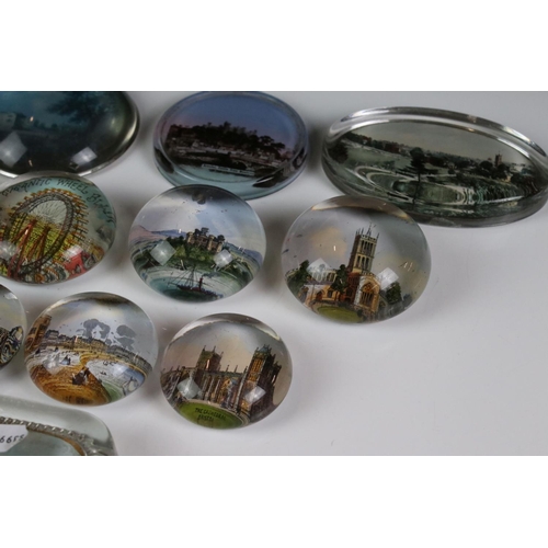 92 - 13 glass paperweights, 19th century onwards, mostly with applied printed souvenir views, featuring B... 