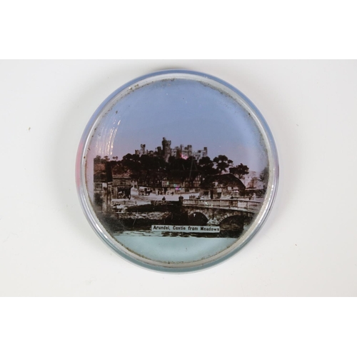 92 - 13 glass paperweights, 19th century onwards, mostly with applied printed souvenir views, featuring B... 