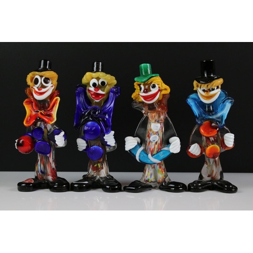 95 - 17 Murano glass clown figures, featuring clown with ukulele, basket-form and dish-form examples (tal... 