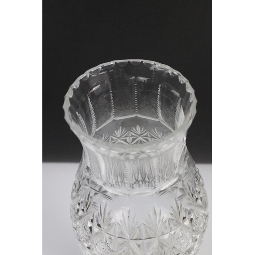 107 - Thomas Webb cut glass oil lamp, the shade of baluster form with star-cut design, raised on a star-cu... 