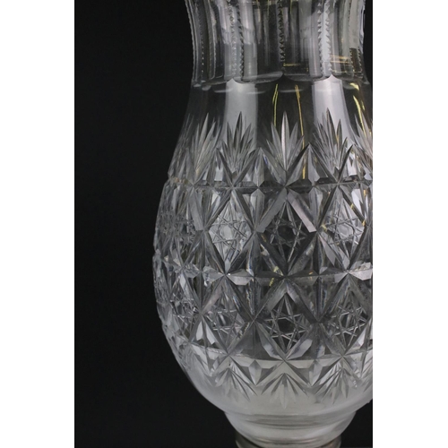 107 - Thomas Webb cut glass oil lamp, the shade of baluster form with star-cut design, raised on a star-cu... 