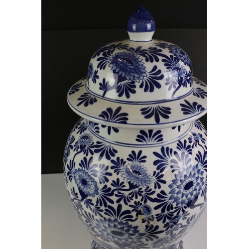 114 - Large 20th Century Chinese Blue & White urn vase & cover, of baluster form, with underglaze blue flo... 