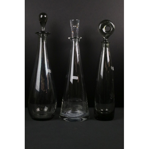 117 - Collection of Holmegaard ' Canada ' drinking glasses to include smoky grey examples (3 x decanters, ... 