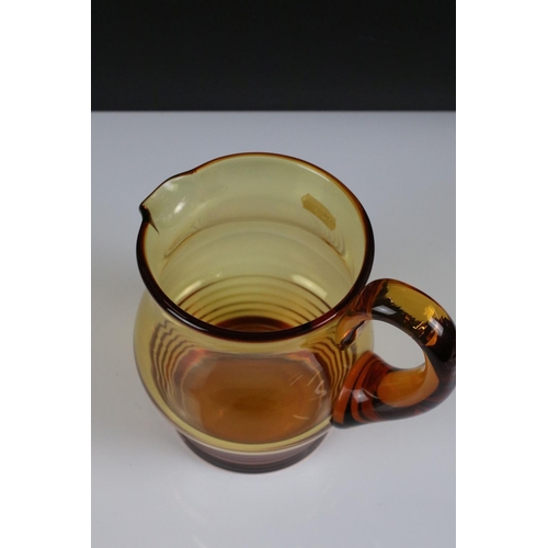 99 - Stuart amber glass lemonade set with part-ribbed bowl design (comprising 6 glasses and a jug - 18cm ... 