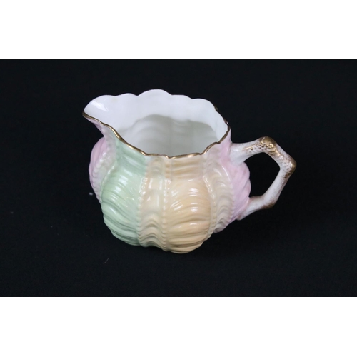 120 - Foley tea set for five, of textured lobed form, decorated with pastel colour glazing and gilt detail... 