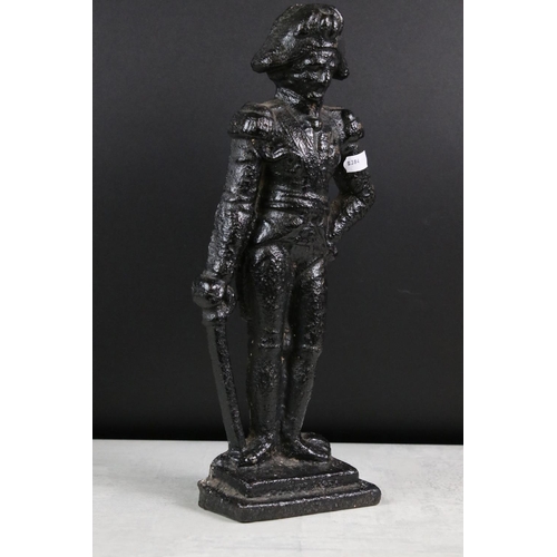 142 - Cast iron door stop modelled as Napoleon, 35cm high