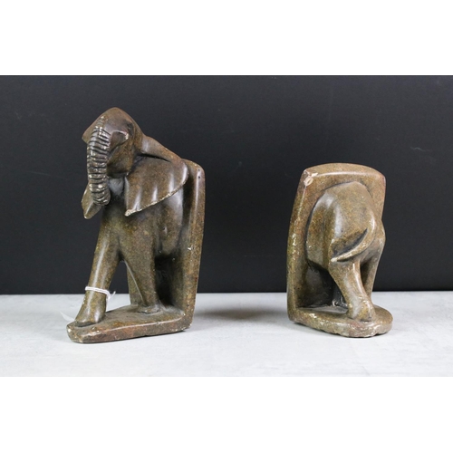 144 - A pair of carved stone elephant bookends