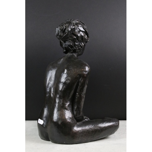 146 - Bronzed resin model of a nude female seated in a cross-legged position, in the manner of Tom Greensh... 