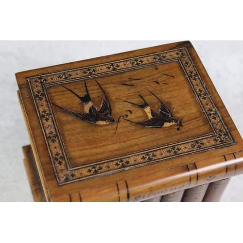 151 - Sorrento Ware olive wood box modelled as a row of books, with inlaid swallow decoration and Tunbridg... 