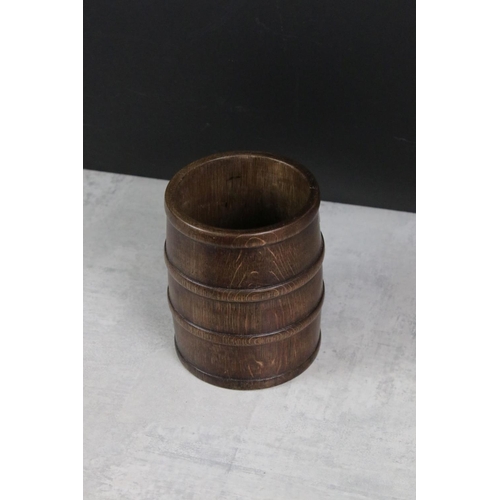 169 - Mouseman - A Robert Thompson English Oak Jar and Cover, of cylindrical barrel form, the cover with c... 