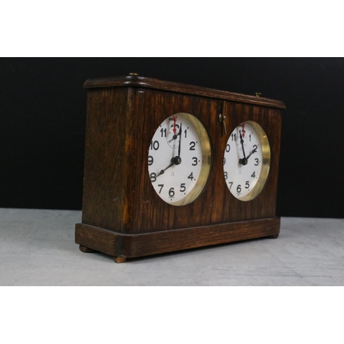 170 - J. Jaques & Son Ltd - 1920s oak cased chess timer clock, with Hamburg and American Clock Company (HA... 