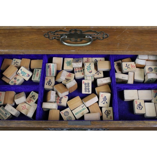 173 - Early 20th Century Chinese Mah-Jong set with bamboo and bone playing pieces, housed within a Chinese... 