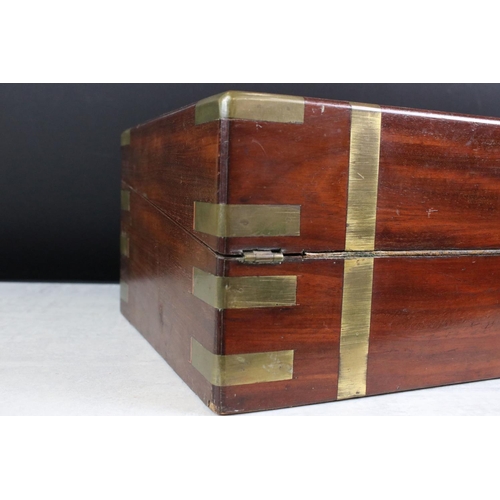 184 - 19th Century Mahogany brass bound writing slope, with tooled leather interior, pen tray and fitted c... 