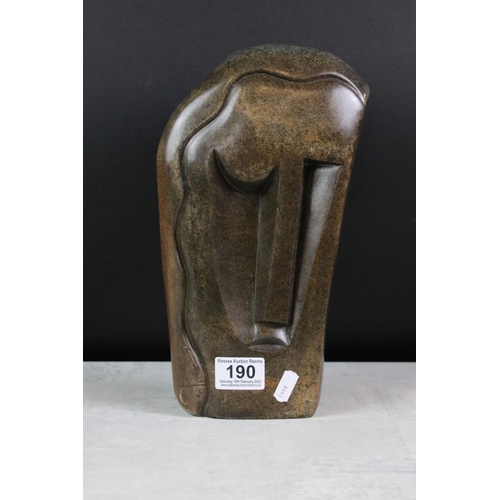 190 - Two Zimbabwean polished stone sculptures to include ' Happy Man ' by Richard Mteki (29cm high), and ... 