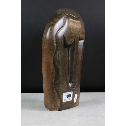 190 - Two Zimbabwean polished stone sculptures to include ' Happy Man ' by Richard Mteki (29cm high), and ... 