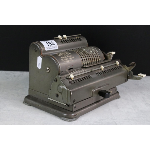 192 - A vintage Muldivo mechanical calculator with turned side handle