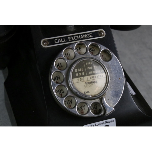 198 - A vintage black telephone, marked 'Call Exchange' complete with lower drawer.